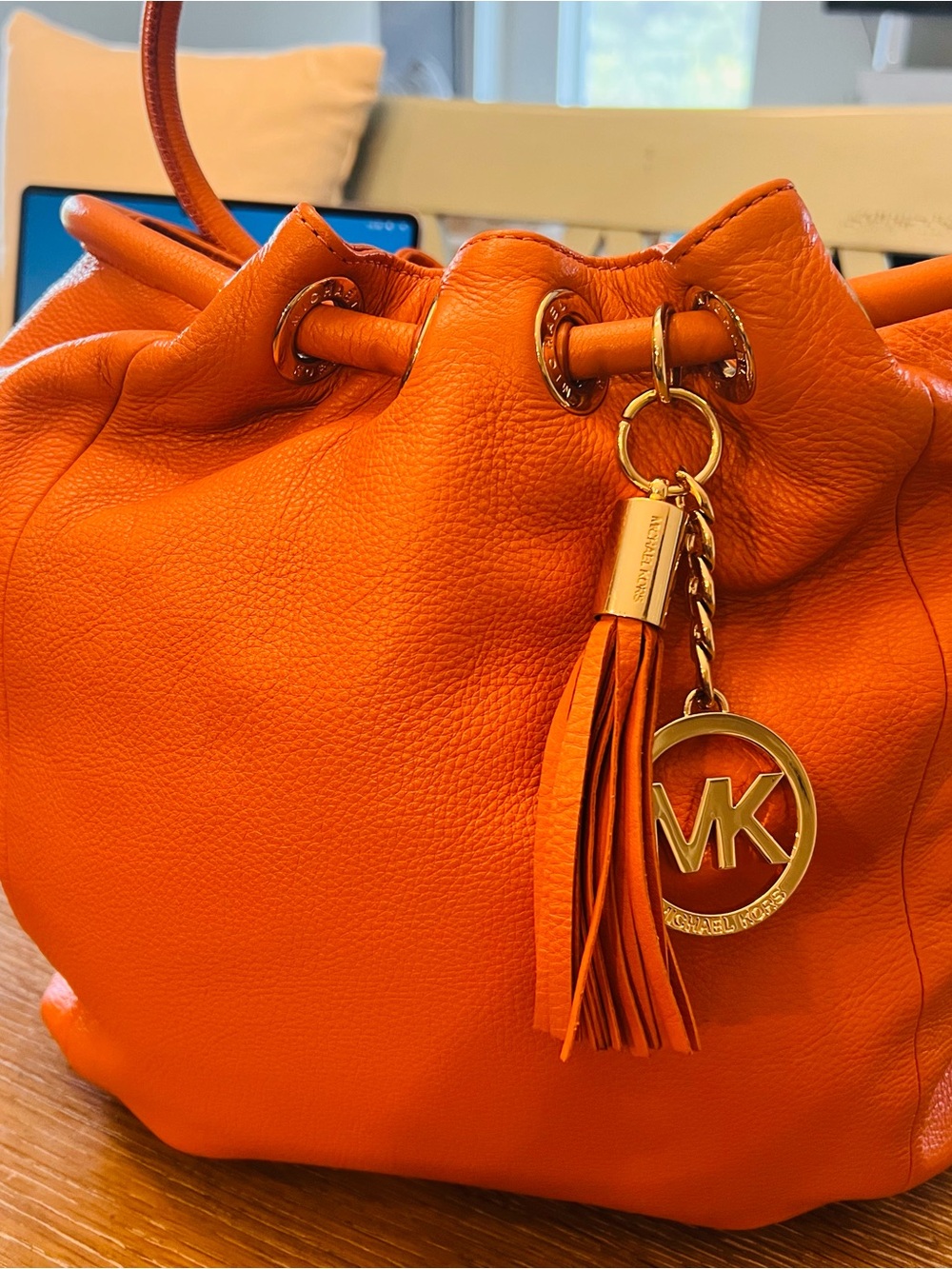 Michael Kors Orange Pebbled Leather Drawstring Shoulder Bag with Tassel